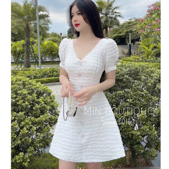 Váy xốp khuy ngọc nơ lưng dáng xòe