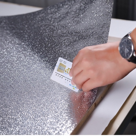 Cuộn 2m DECAL GIẤY BẠC BÓNG dán bếp chống thấm tiện lợi ( loại nhăn khổ 2m* 60cm)