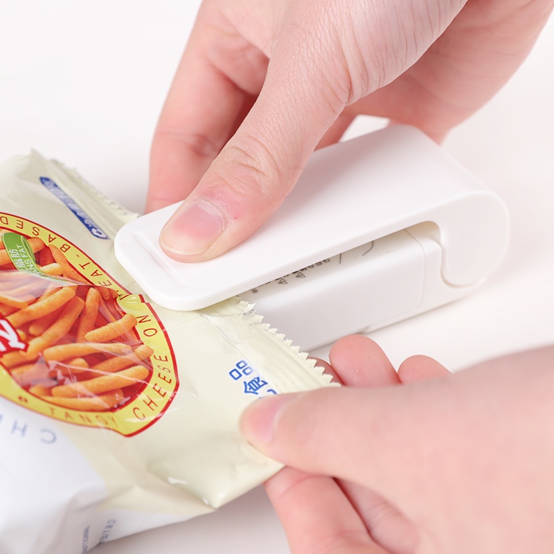 Fashionable colorful mini portable food bag sealing machine
