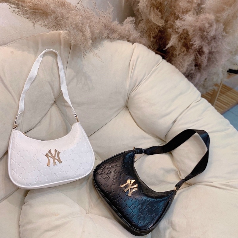 Túi kẹp nách chất da PU mềm logo thêu siêu hot