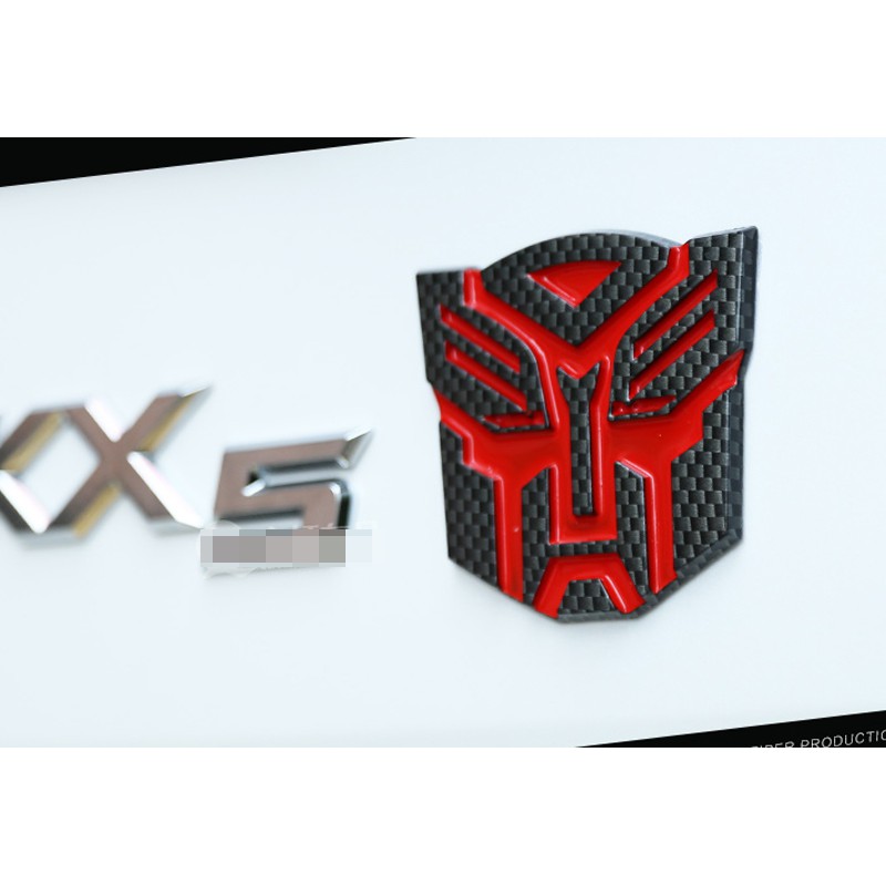 Biểu tượng sợi carbon trang trí xe hơi