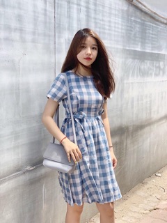 Đầm caro nơ eo .