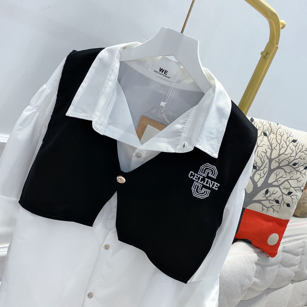 Set sơ mi nữ trắng form rộng tay dài kèm áo ghi lê đen cá tính