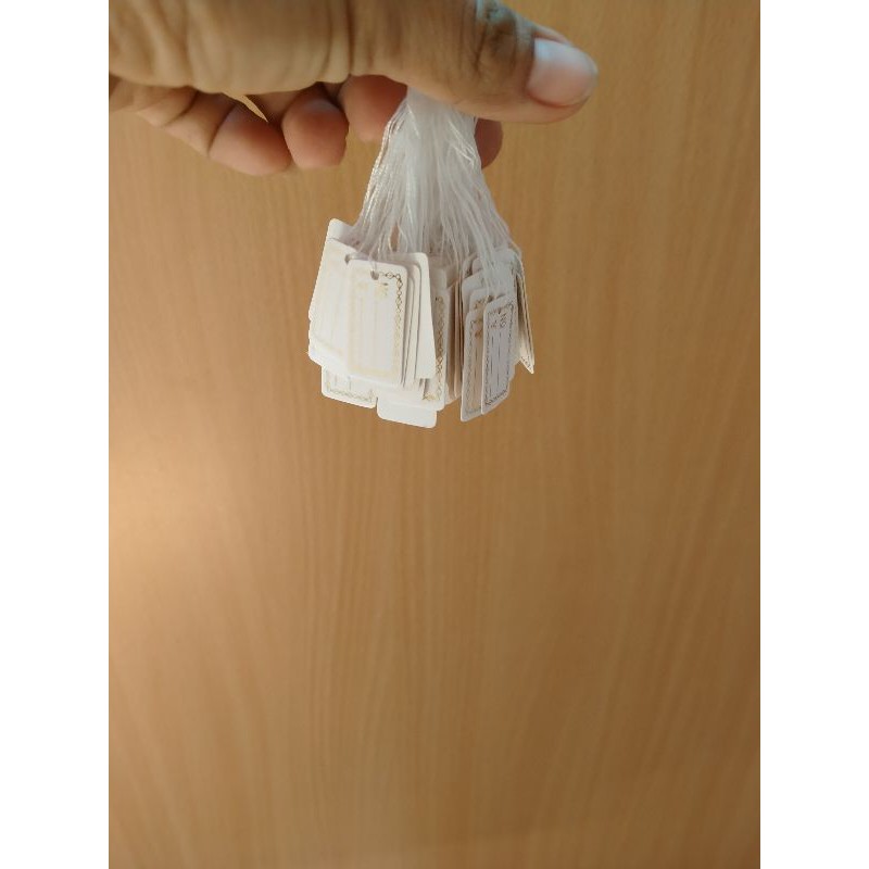 Tem làm giá cột chỉ trắng