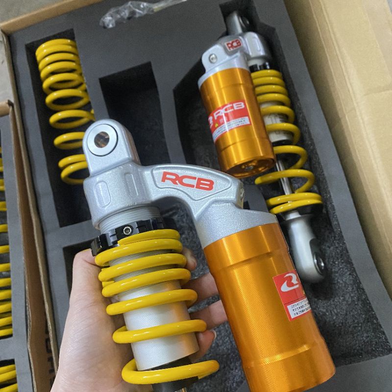 Phuộc nhún sau RCB bình dầu cho các xe Wave Dream Sirius Jupiter Cub chaly Ellegant Axelo Future...