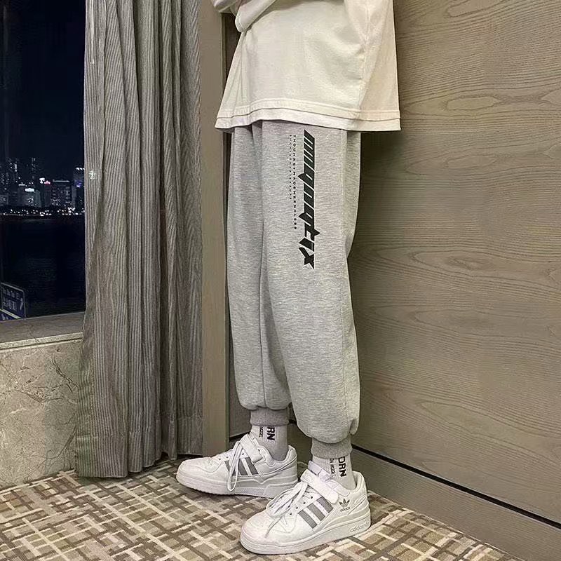Quần dài thể thao ống rộng in chữ phong cách Hàn Quốc năng động thời trang cho nam size m - 5xl