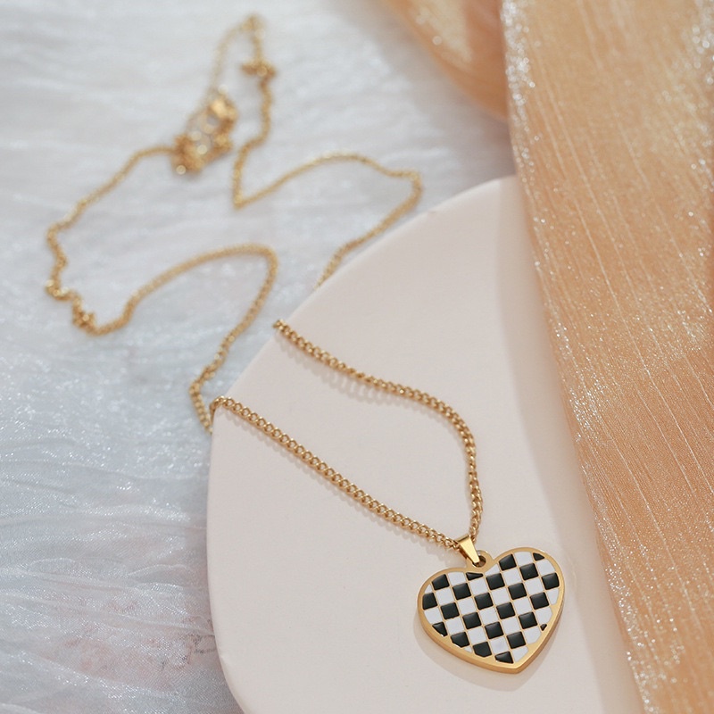 Dây chuyền vòng cổ titan tim caro không ghỉ sét