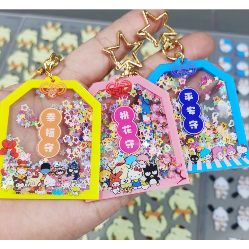 MÓC KHÓA SHAKER KIM TUYẾN ACRYLIC HÌNH TÚI OMAMORI PHONG CÁCH HOẠT HÌNH