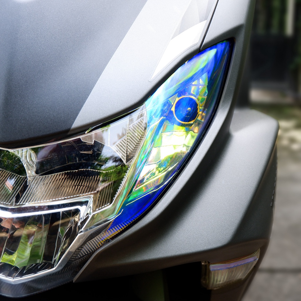 Decal bảo vệ XI NHAN xe YAMAHA FREEGO chuyển màu xanh cánh cam