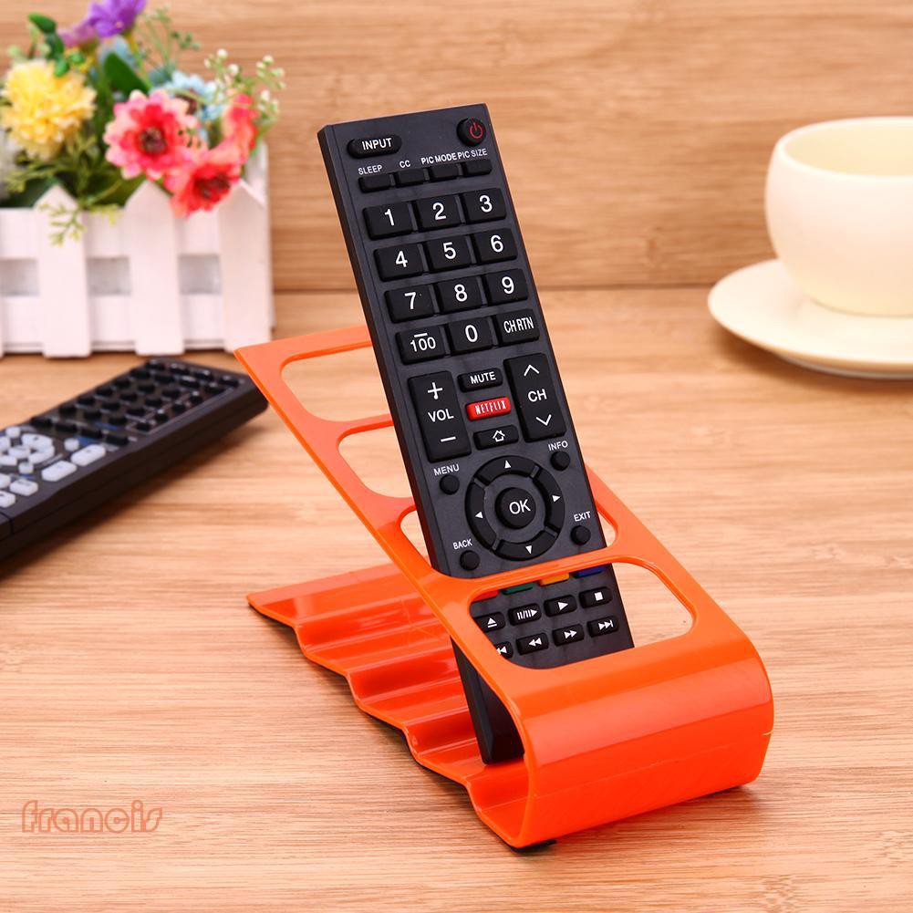 Giá để remote 4 ngăn được làm từ nhựa , dùng sắp xếp điện thoại