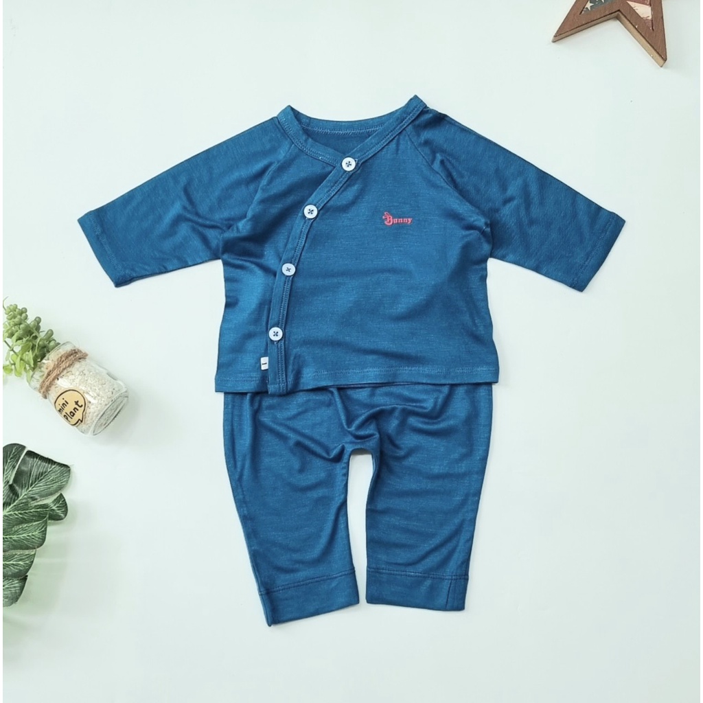 Bộ sơ sinh Kwoo, Bộ thun lạnh dài tay cho bé cúc chéo quần đáp đũng Quần áo sơ sinh bé gái bé trai Thị Nắng Store