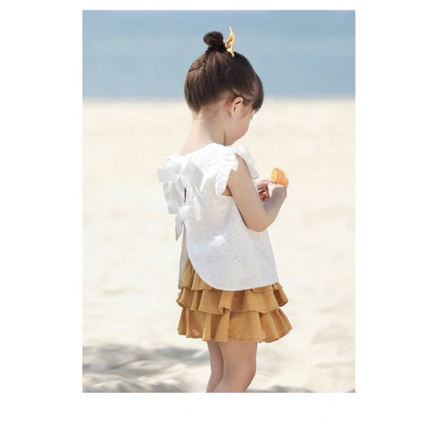 Set bộ bé gái áo trắng kèm chân váy vàng thoáng mát