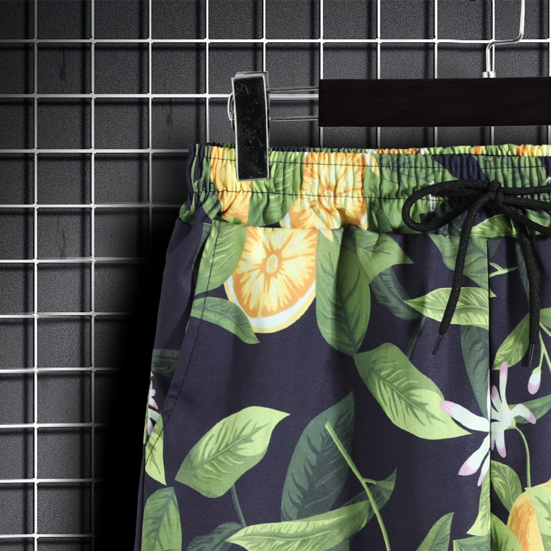 Quần short đi biển hoạ tiết lá xanh cho nam và nữ size M-5XL