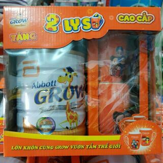 (Tặng 2 ly sứ ngẫu nhiên) 1 lon sữa Abbott Grow 4 900g