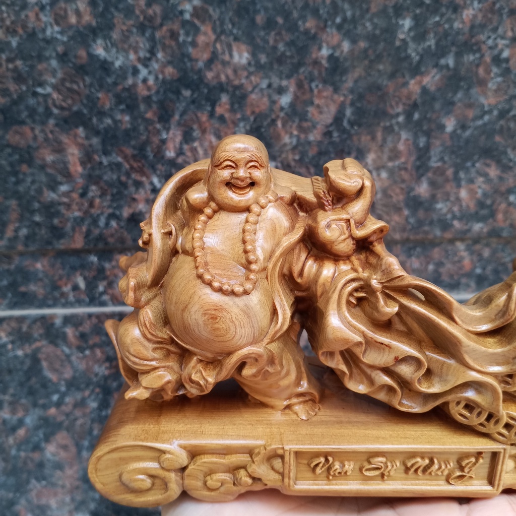 Tượng phật di lặc kéo bao tiền bằng gỗ thơm đế vạn sự như ý