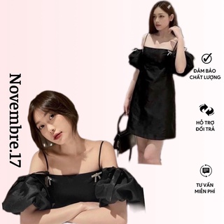 Đầm đen tay bồng đính nơ ngực