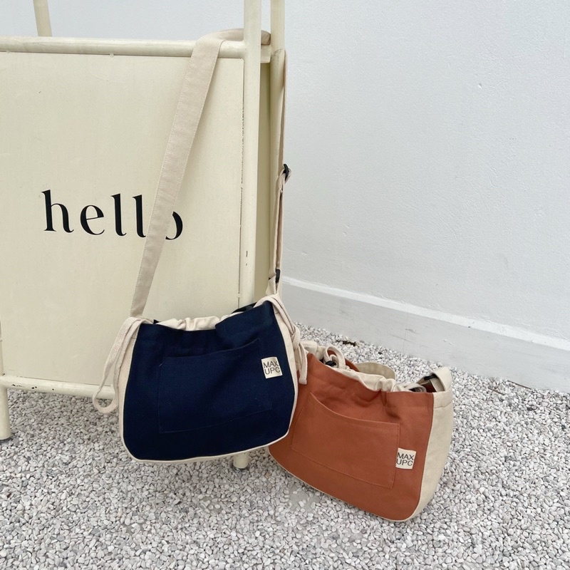 Túi Đeo Chéo “Mini Mandu Bag” Miệng Túi Dây Rút Vải Canvas