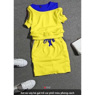 Set bộ bé gái gồm áo rớt vai phối màu đi cùng với váy sành điệu, chất thun cotton mềm mại, thoáng mát, thấm hút mồ hôi,,