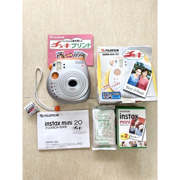 Máy chụp ảnh lấy liền Fujifilm Instax Mini 20 Cheki , tặng hộp film 10 tấm date 2023, tặng Pin CR2, tặng dây đeo