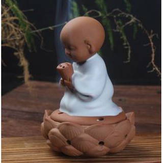 Tượng chú tiểu đốt trầm