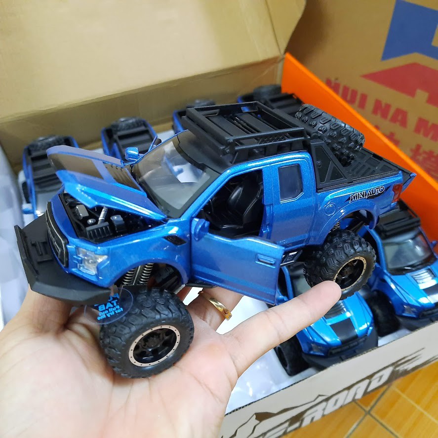 Xe mô hình ô tô FORD offroad F150 tỉ lệ 1:32 bằng hợp kim và nhựa đồ chơi trẻ em có âm thanh và đèn mở được cửa