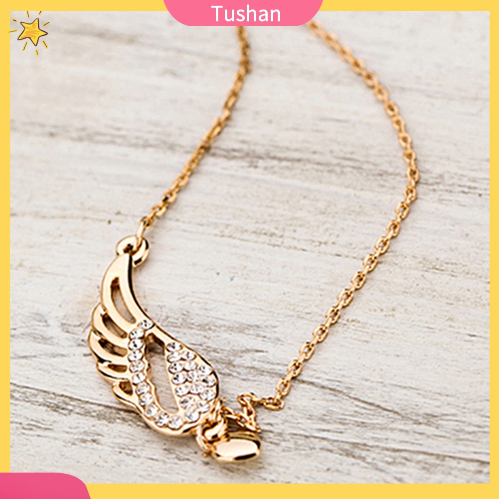 Dây chuyền mặt trái tim và đôi cánh thiên thần tush _