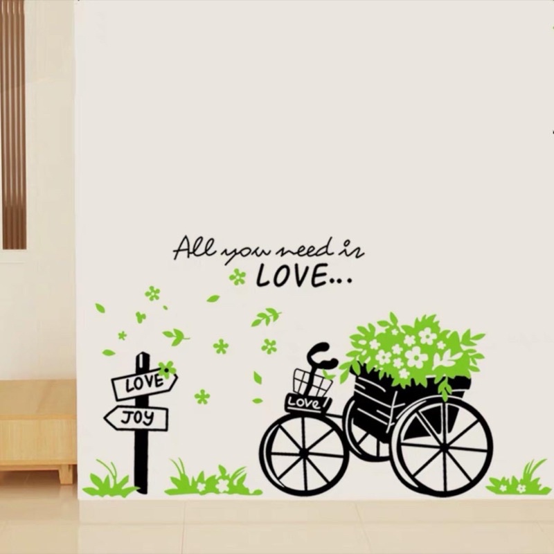 Decal dán tường xe đạp giỏ hoa xanh trang trí phòng khách.