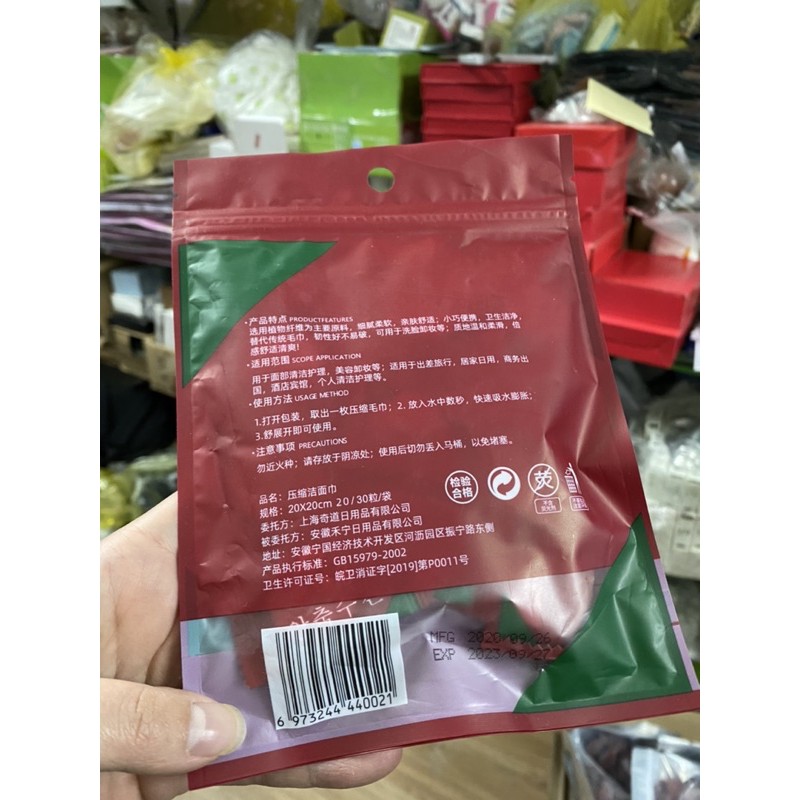 GÓI 20 VIÊN KHĂN GIẤY NÉN HÀN QUỐC DẠNG VIÊN KẸO GÓI ĐỎ ( viên tròn)