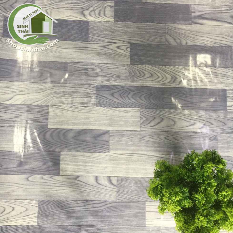 Thảm nhựa PVC simili trải sàn vân gỗ màu xám bóng