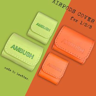 Vỏ bọc hộp sạc tai nghe hiệu AMBUSH bằng da sang trọng chống sốc dành cho AirPods