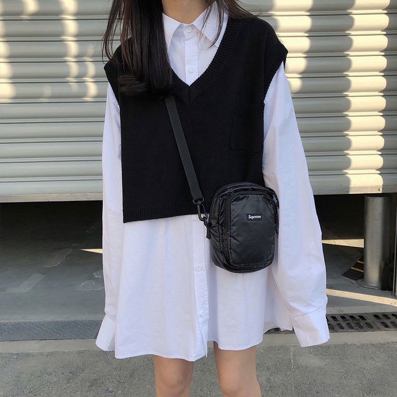 Áo sweater dệt kim sát nách cổ chữ V dáng rộng xẻ tà thời trang dành cho nữ