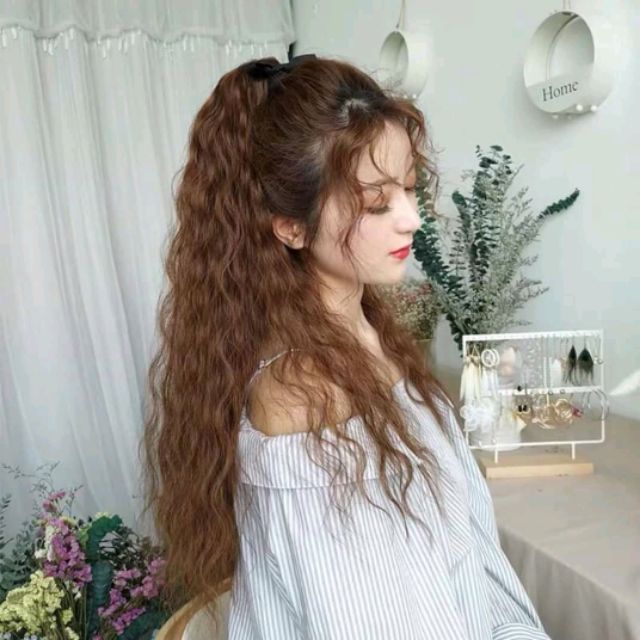 cột xù mì tóc giả