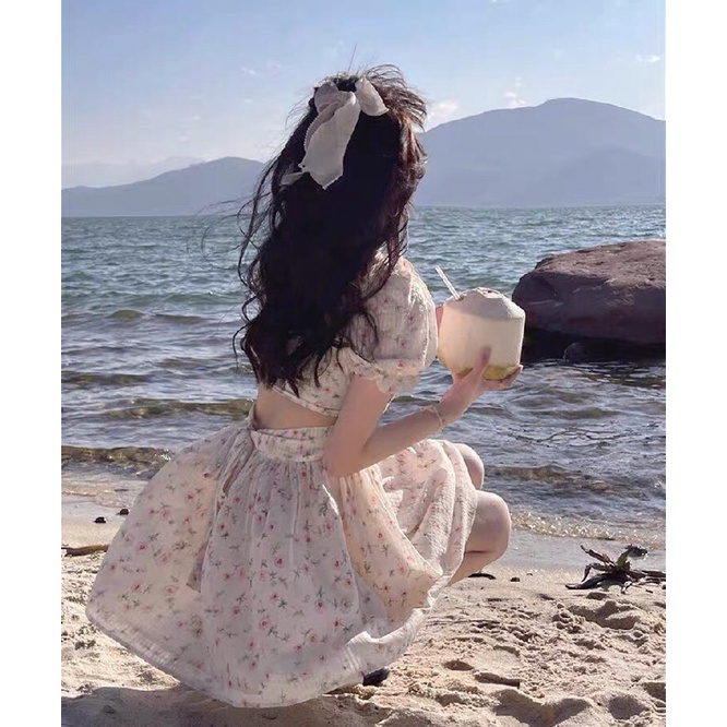 Đầm hoa nhíu xếp ngực nơ lưng cutout