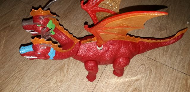 Khủng long chạy PIN 2 đầu có cánh và đẻ trứng có nhạc đèn Led tặng kèm PIN