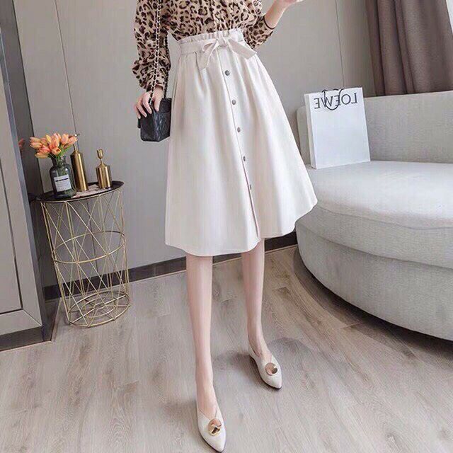 Chân váy chữ A kèm dây thắt nơ dài tới gối sang chảnh. | BigBuy360 - bigbuy360.vn