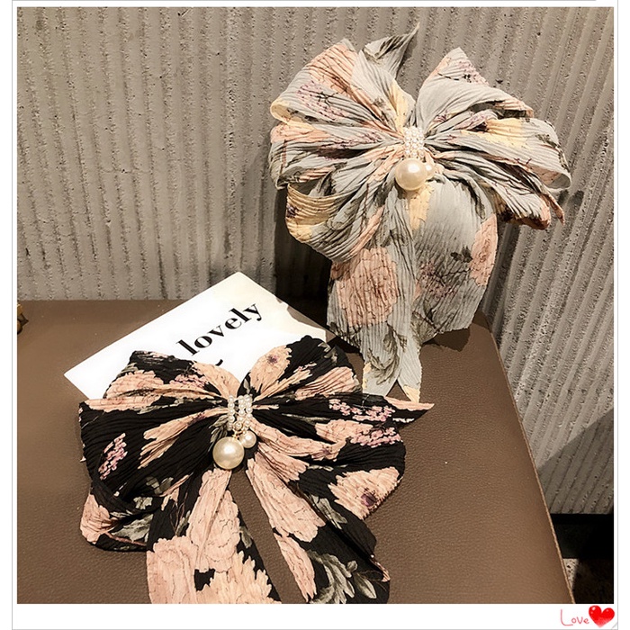 Kẹp tóc hình nơ đính hạt ngọc trai phong cách Hàn Quốc