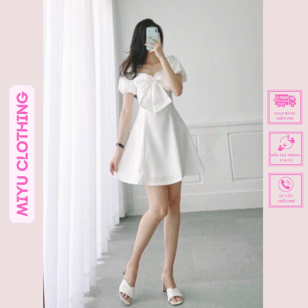 Đầm dự tiệc trắng dáng xòe váy nữ dạo phố tay ngắn ngực đính nơ chất liệu cotton gân mịn 2 lớp Miyu Clothing
