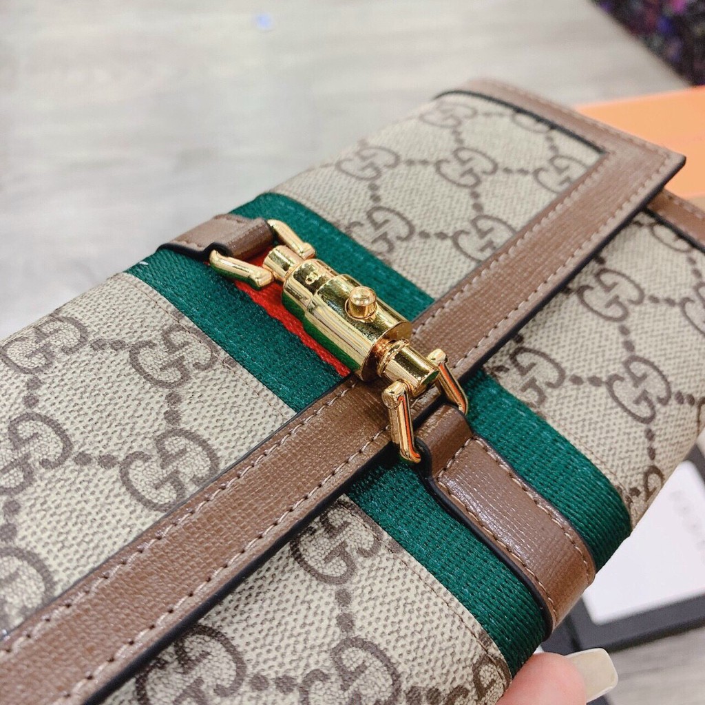 Ví cầm tay Gucci/Clutch cầm tay