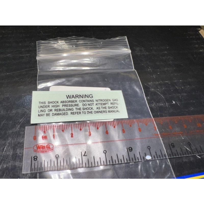 Tem Warning bình dầu phuộc Ohlins