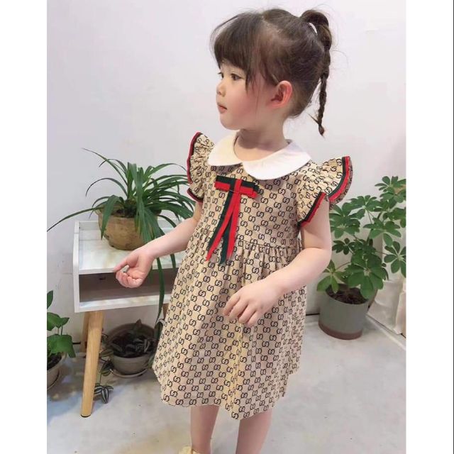 Váy nơ cổ bèo bé gái