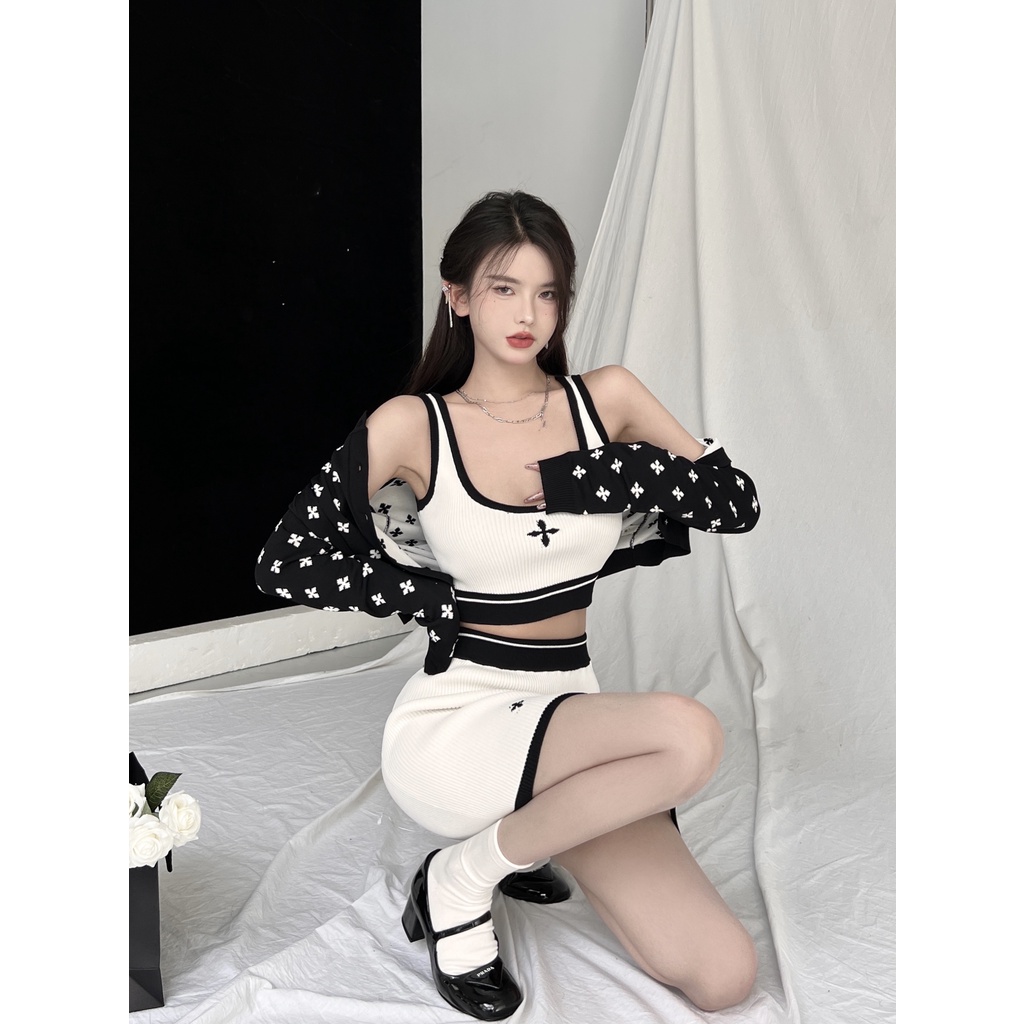 Porozi  Set đồ  gồm áo hai dây dáng ngắn + chân váy lưng thun thời trang cá tính cho nữ