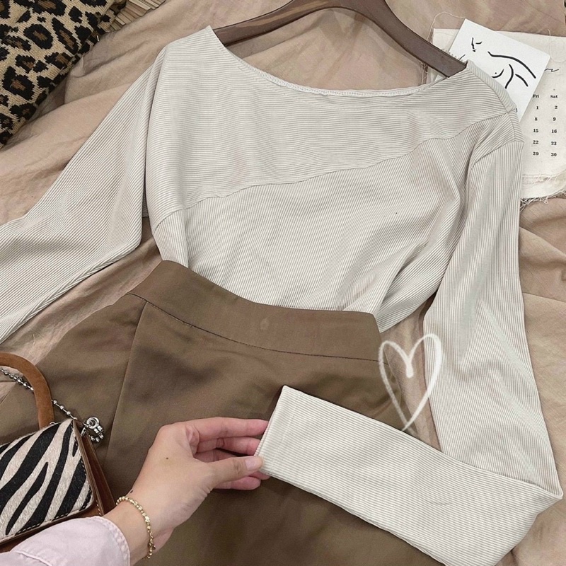 Set 2 món áo lệch vai td cách điệu kèm chân váy chéo xẻ.