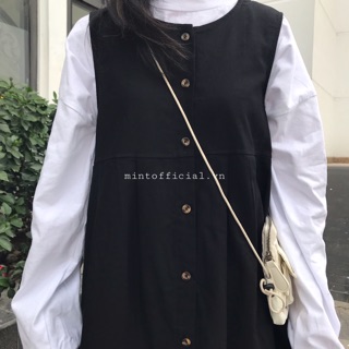 Set áo trắng đầm đen nút cúc