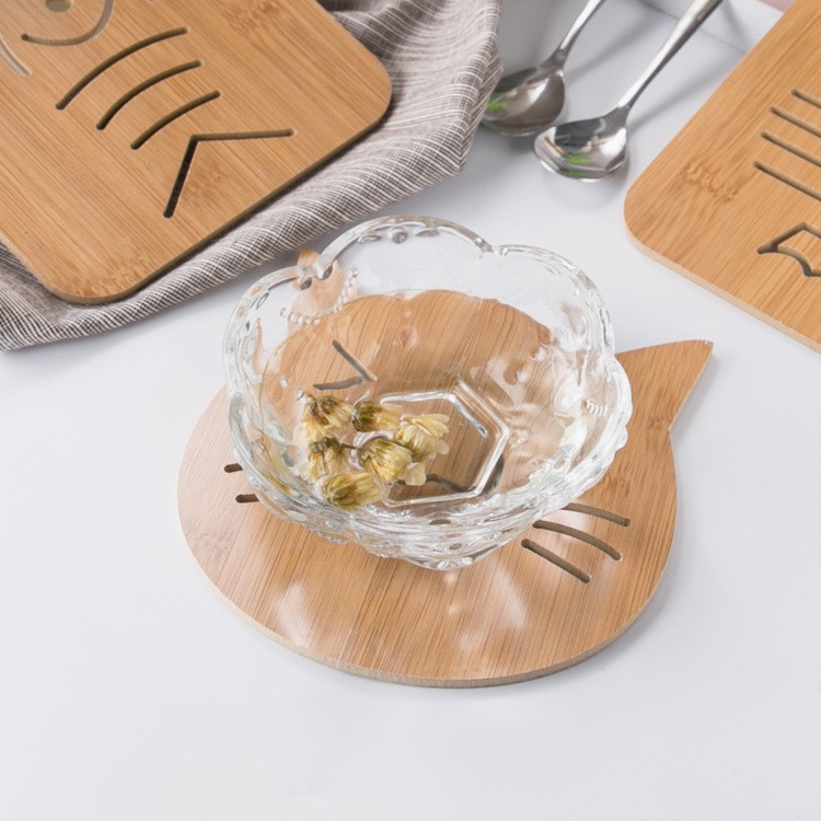 Tấm lót nồi/ chén trên bàn bằng gỗ kiểu lỗ rỗng hình hoạt hình cách điện chống bỏng cho nhà bếp