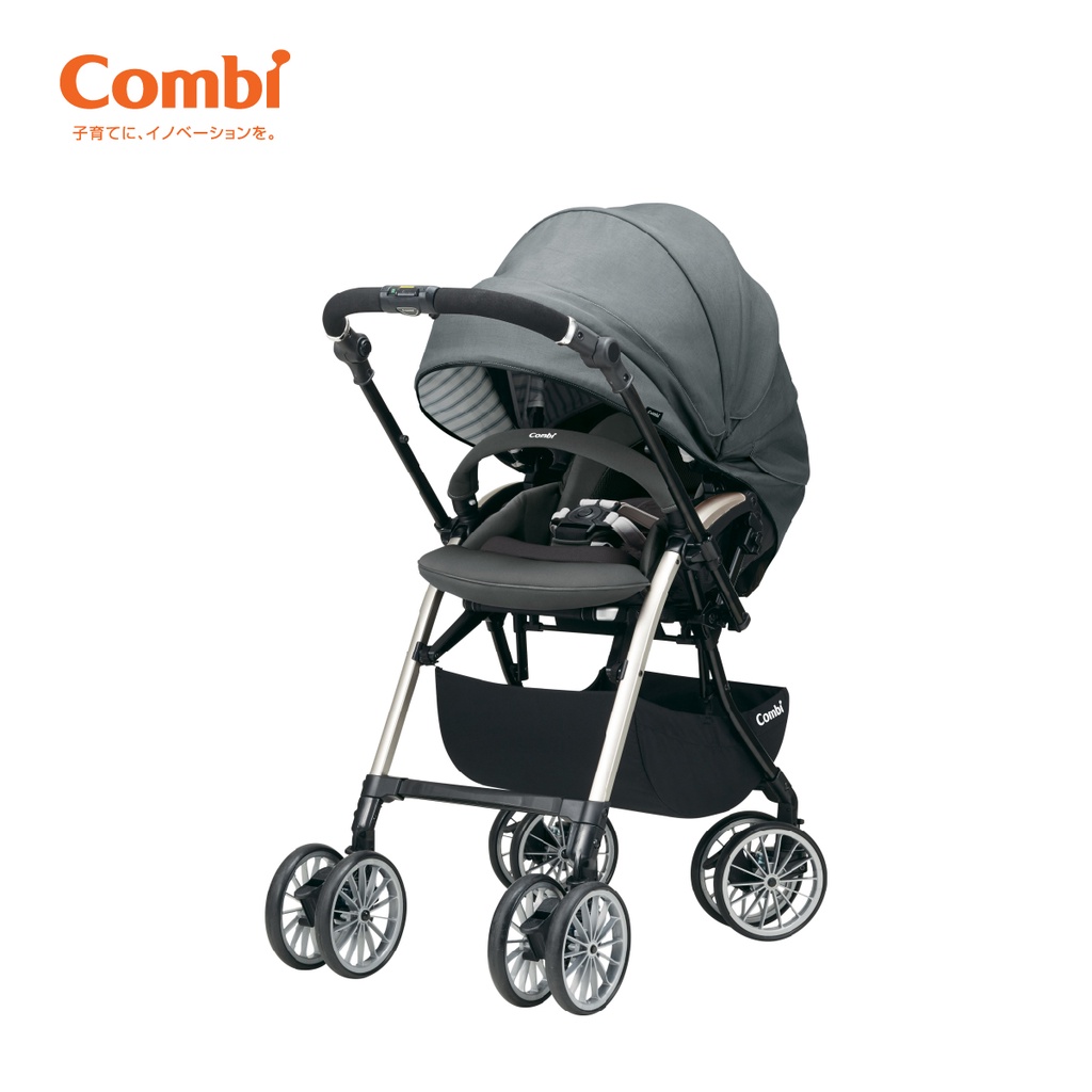 Xe đẩy Combi Umbretta 4 bánh quay tự động nâu kaki/ ghi silver