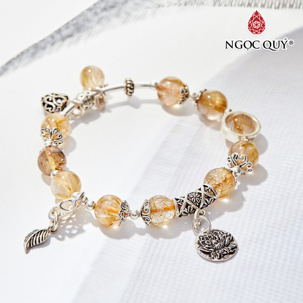 Vòng tay TA tóc vàng phối charm hoa sen bạc - Ngọc Quý