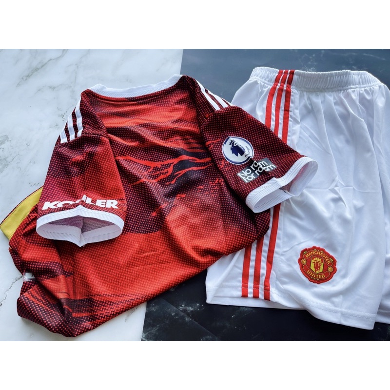 Set bộ quần áo thể thao bóng đá vải gai thái clb manchester united áo đỏ quần trắng 2022
