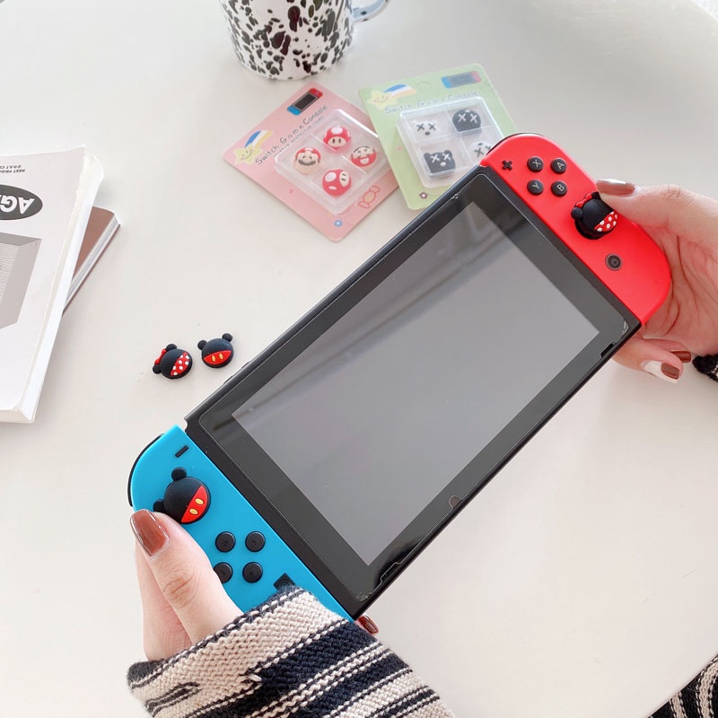 Bộ 4 nắp silicon bọc nút bấm tay cầm chơi game Nintendo lite OLED chất lượng