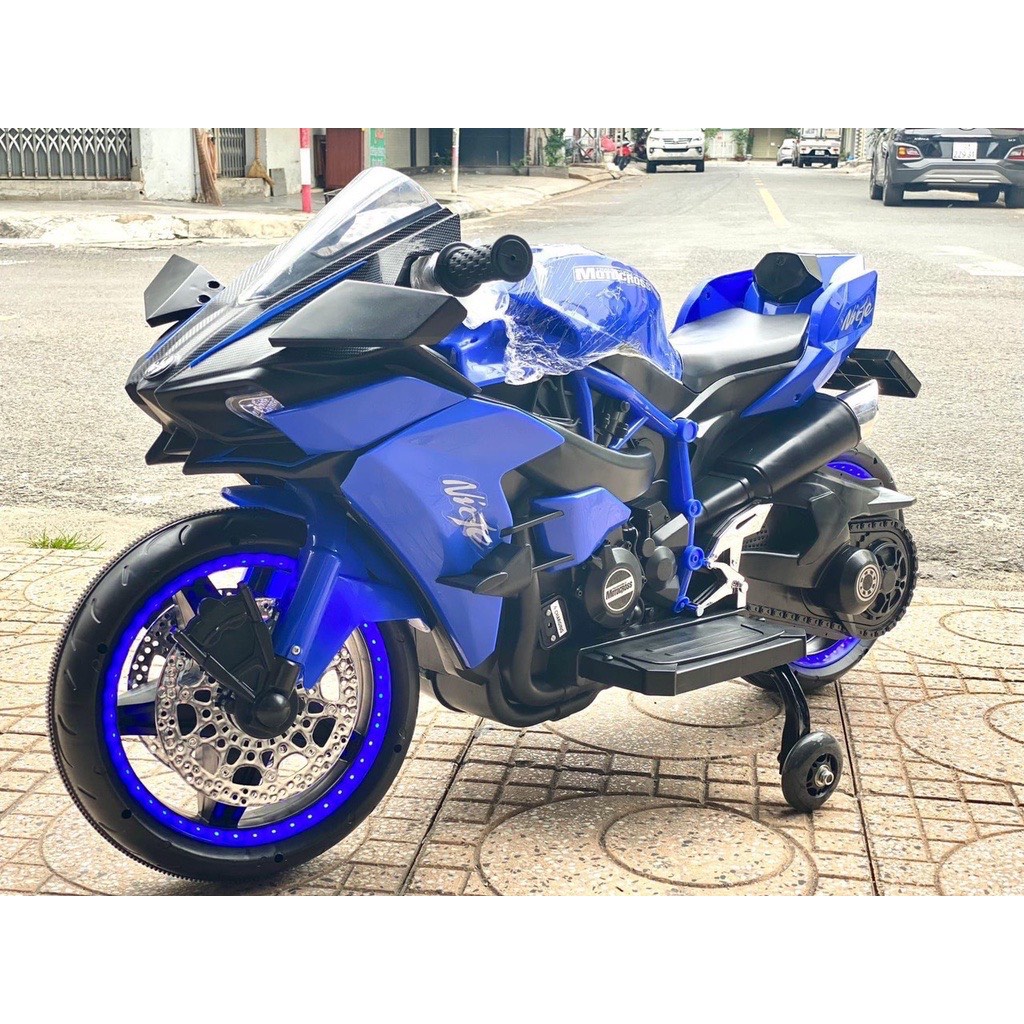 Xe máy điện cho bé xe máy điện trẻ em Ninja H2R siêu thể thao sử dụng chân ga bánh xe có đèn sáng