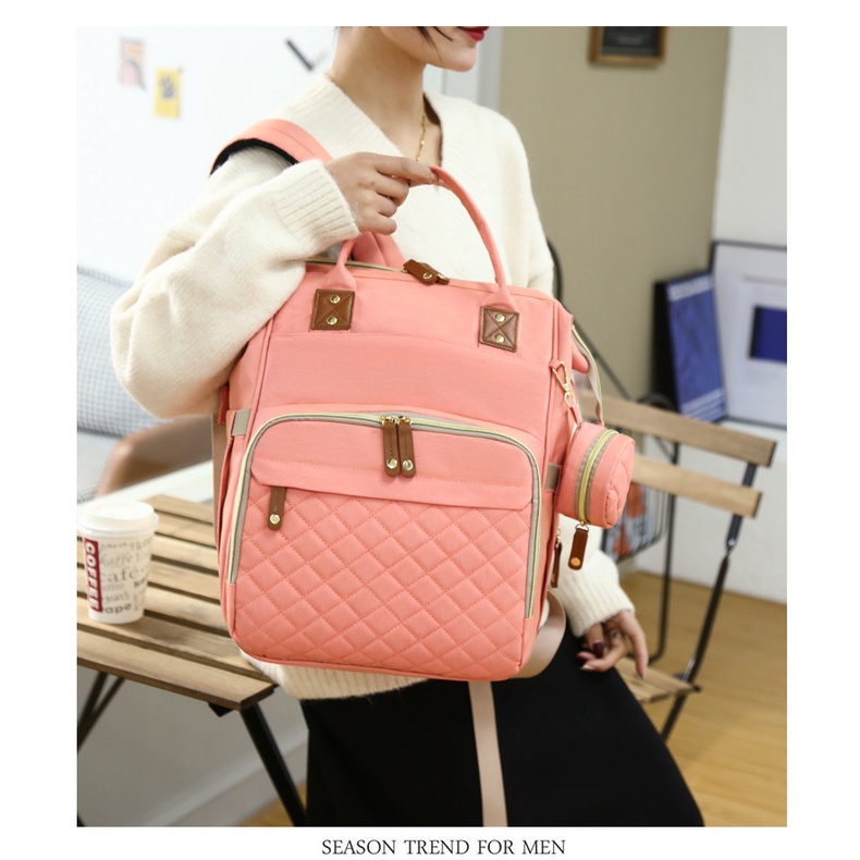 Balo bỉm sữa đa năng cho mẹ và bé cao cấp có thể làm giường nằm cho trẻ,nhiều ngăn đựng chống thấm nước tiện dụng